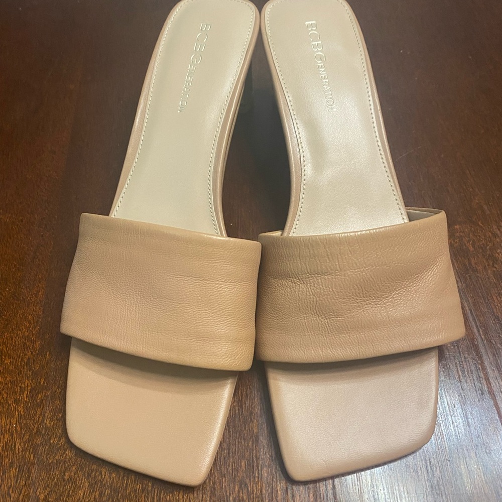Kerin beige slide leather upper gold accent on heel. Size 9 never worn w/o box.